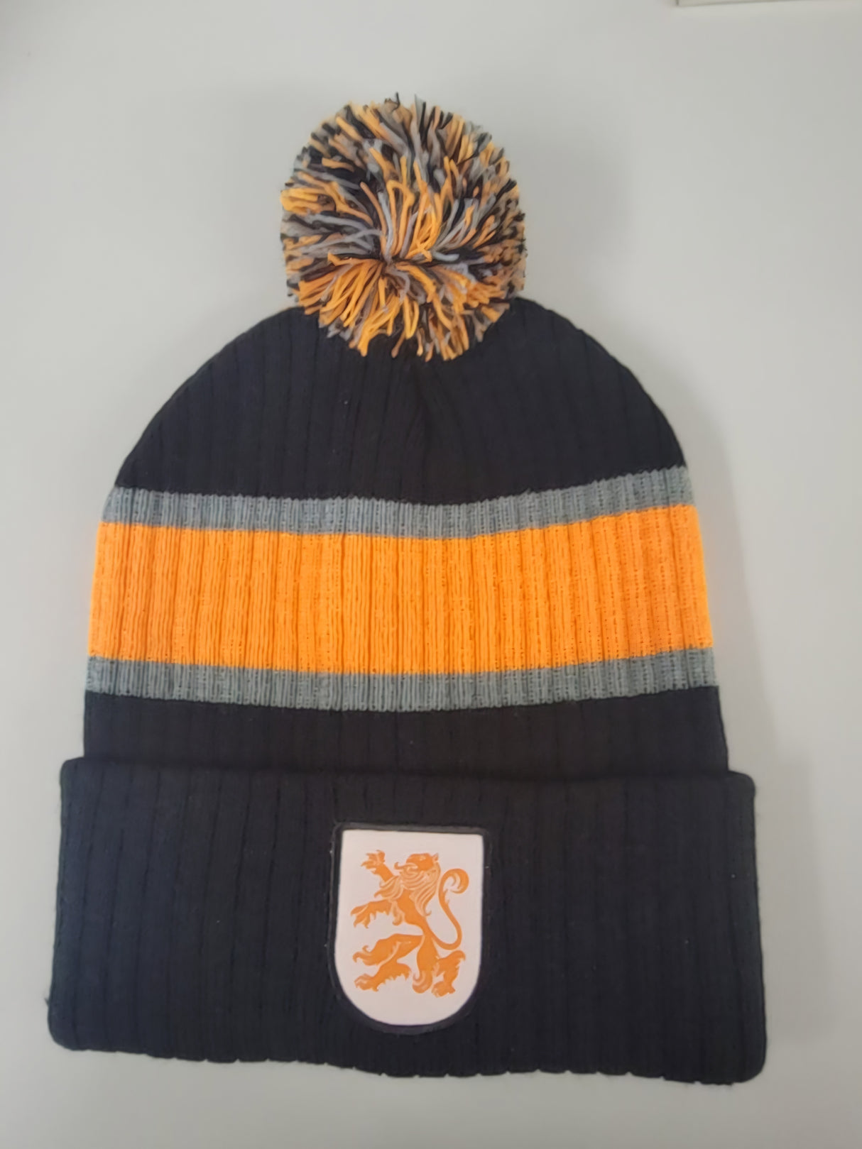 Toque - Black with Orange Lion Patch with Pompom